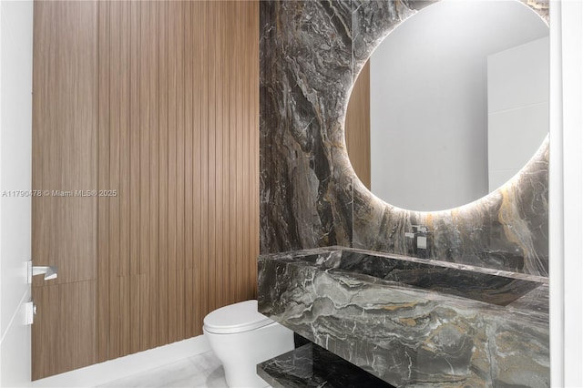 12331 SW 2nd St, Plantation, FL 33325 - bathroom with marble tiled flooring and toilet