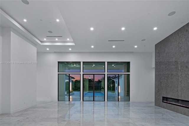 12331 SW 2nd St, Plantation, FL 33325 - unfurnished room with marble tiled flooring, recessed lighting, a fireplace, and baseboards