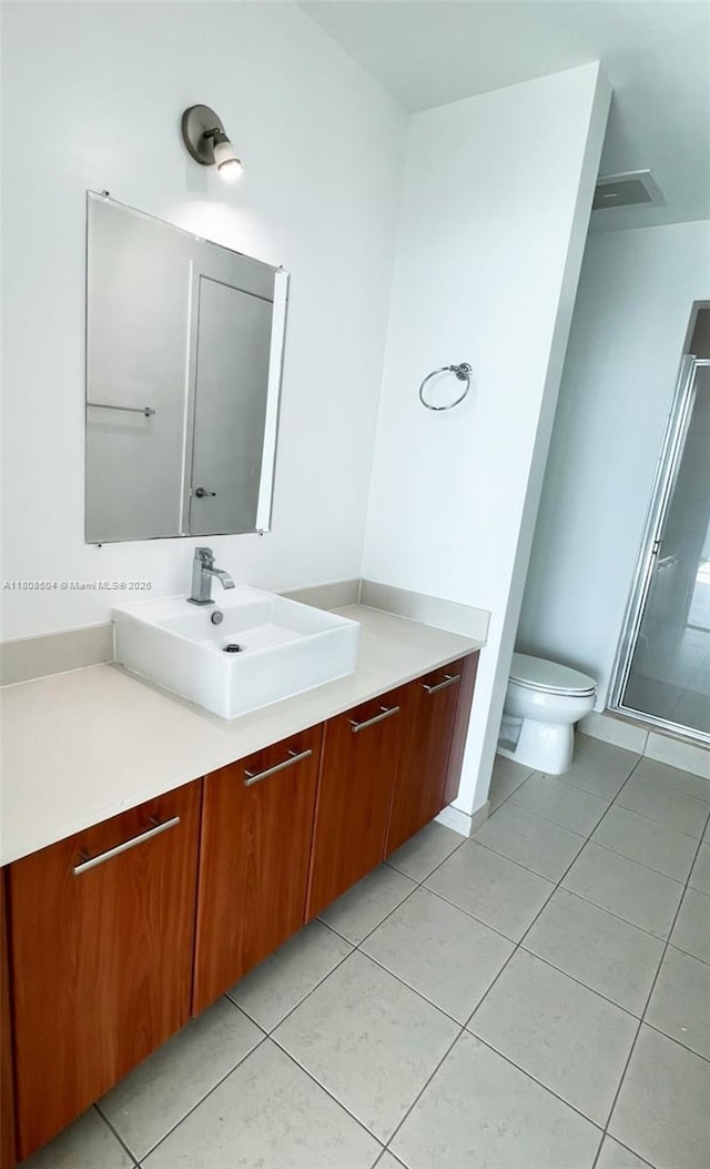 3301 NE 1st Ave Unit H2304, Miami, FL 33137 - full bath with toilet, vanity, tile patterned flooring, and a shower stall