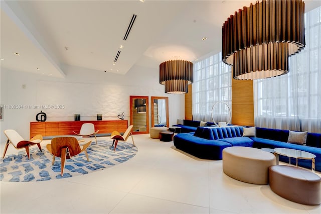 3301 NE 1st Ave Unit H2304, Miami, FL 33137 - recreation room with plenty of natural light and vaulted ceiling