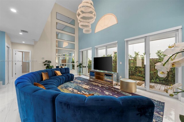 1930 SW 12th Ave, Miami, FL 33129 - living area featuring a high ceiling, marble finish flooring, and recessed lighting