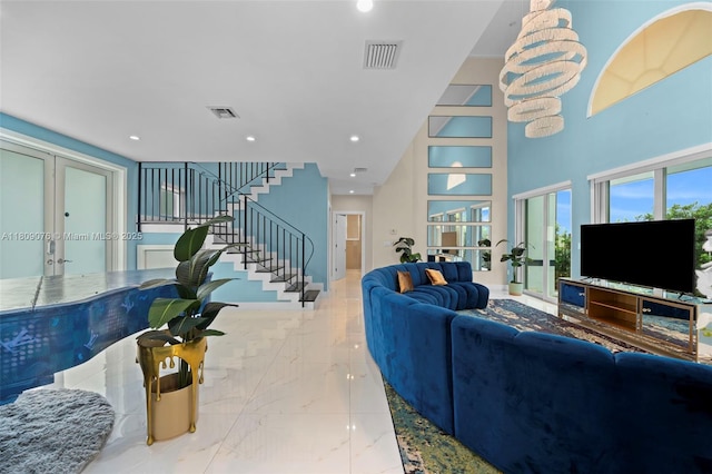 1930 SW 12th Ave, Miami, FL 33129 - living room featuring french doors, marble finish flooring, stairway, recessed lighting, and a high ceiling