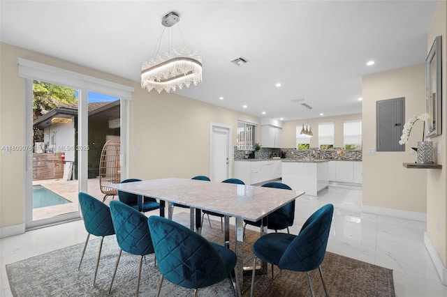 1930 SW 12th Ave, Miami, FL 33129 - dining space featuring light marble finish flooring, electric panel, baseboards, recessed lighting, and a chandelier