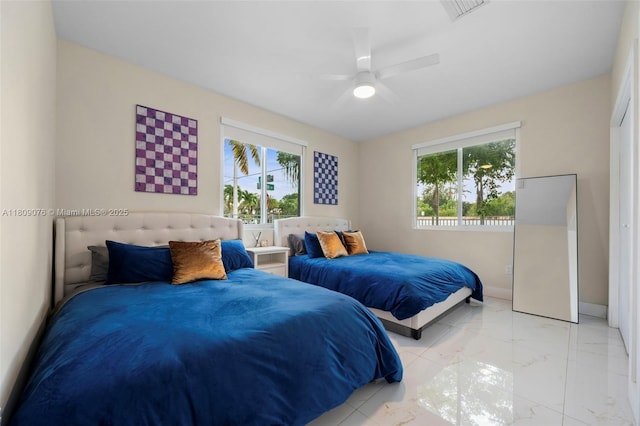 1930 SW 12th Ave, Miami, FL 33129 - bedroom with multiple windows, marble finish flooring, baseboards, and ceiling fan
