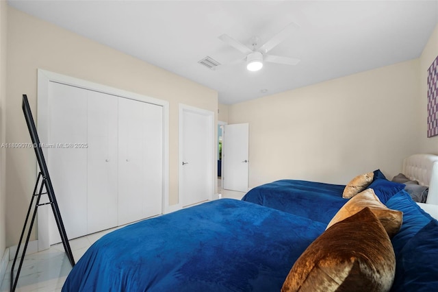 1930 SW 12th Ave, Miami, FL 33129 - bedroom featuring a closet, a ceiling fan, and light marble finish floors
