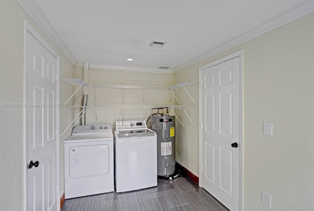 5156 Hartwick Ln, West Palm Beach, FL 33415 - washroom featuring washer and dryer, water heater, crown molding, and baseboards