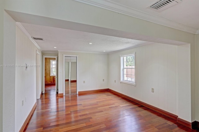 5156 Hartwick Ln, West Palm Beach, FL 33415 - unfurnished room featuring crown molding, light wood-type flooring, and baseboards