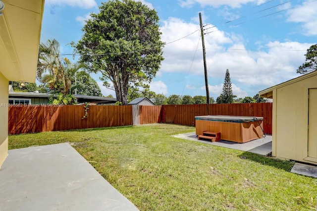 5156 Hartwick Ln, West Palm Beach, FL 33415 - view of yard featuring a hot tub and a patio