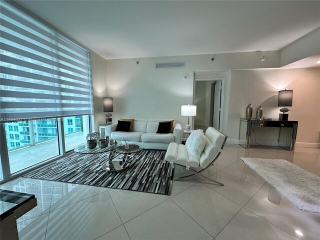 950 Brickell Bay Dr Unit 2607, Miami, FL 33131 - living area with tile patterned floors and baseboards