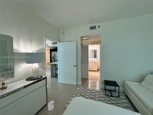 950 Brickell Bay Dr Unit 2607, Miami, FL 33131 - bedroom featuring light tile patterned floors and baseboards