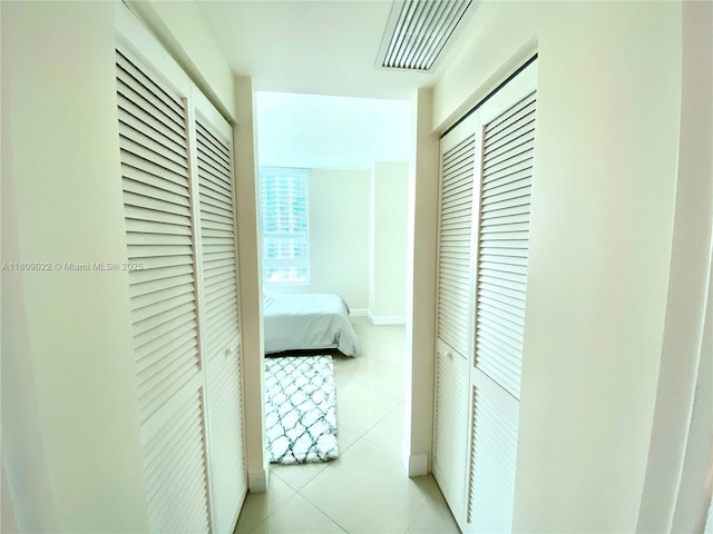 950 Brickell Bay Dr Unit 2607, Miami, FL 33131 - corridor with light tile patterned floors