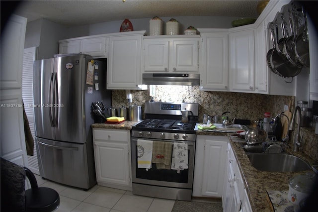 10321 Fairway Heights Blvd, Miami, FL 33157 - kitchen featuring stainless steel appliances, under cabinet range hood, a sink, and white cabinets