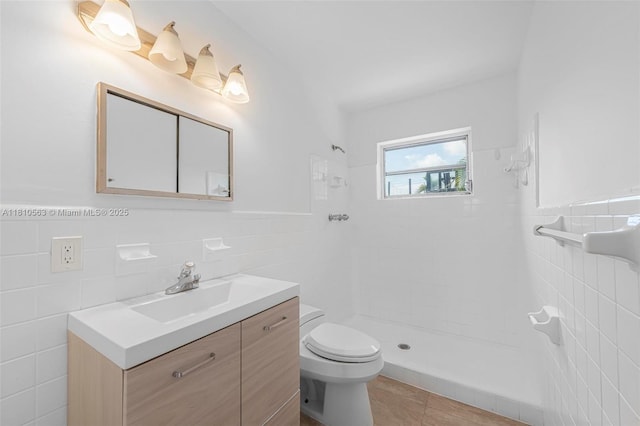 3202 SW 3rd St, Miami, FL 33135 - full bath with tile walls, toilet, vanity, tiled shower, and tile patterned floors
