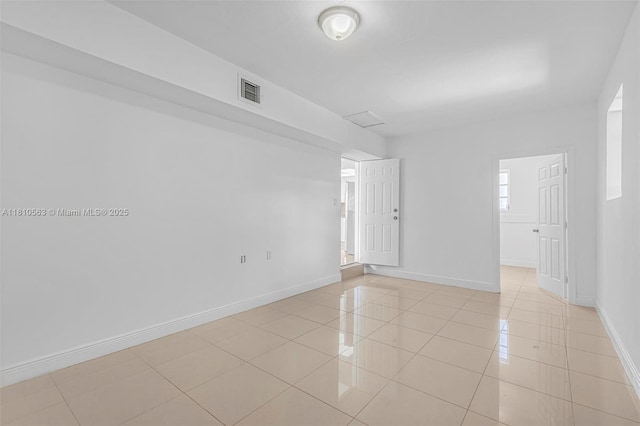 3202 SW 3rd St, Miami, FL 33135 - unfurnished room featuring light tile patterned floors and baseboards