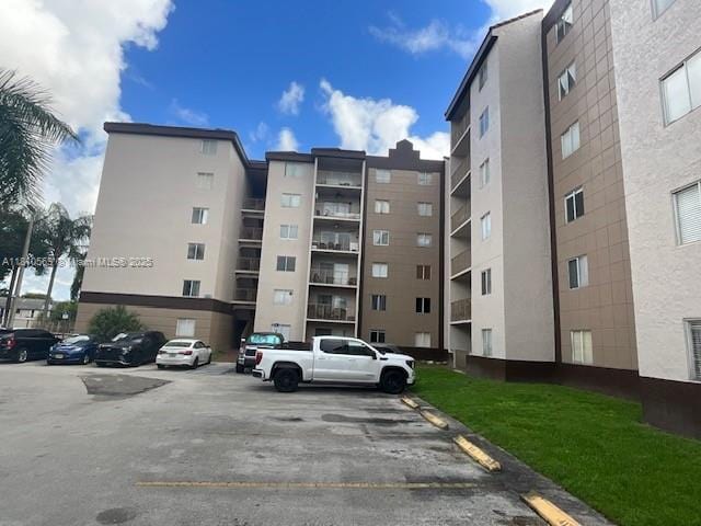 15221 SW 80th St Unit 201, Miami, FL 33193 - view of apartment building / complex featuring uncovered parking