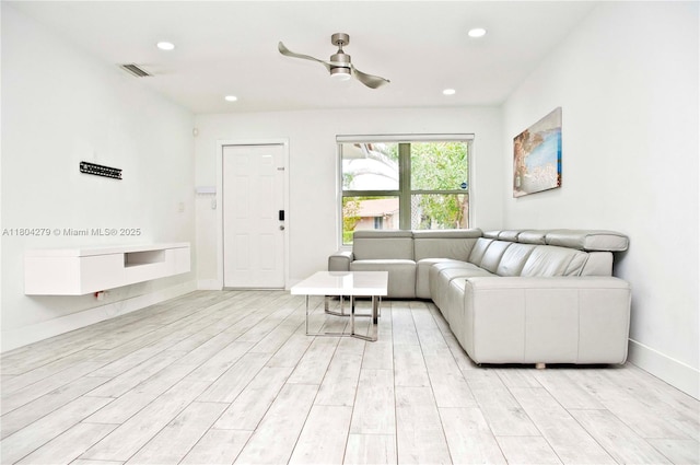1328 NW 93rd Ter, Coral Springs, FL 33071 - living room with light wood-style floors, a ceiling fan, recessed lighting, and baseboards
