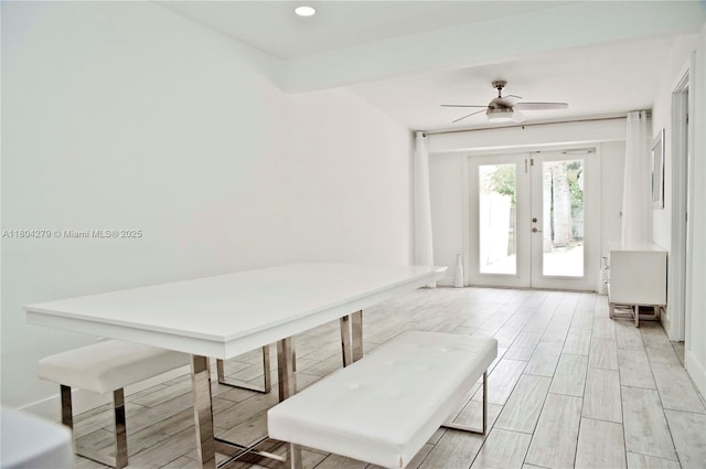 1328 NW 93rd Ter, Coral Springs, FL 33071 - dining space featuring light wood-type flooring, ceiling fan, and french doors