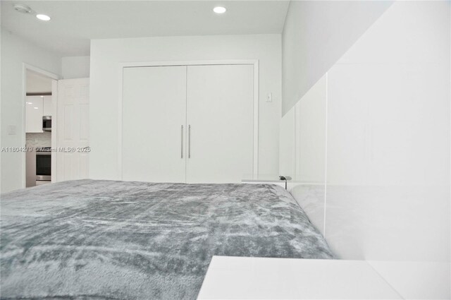 1328 NW 93rd Ter, Coral Springs, FL 33071 - unfurnished bedroom with recessed lighting and a closet