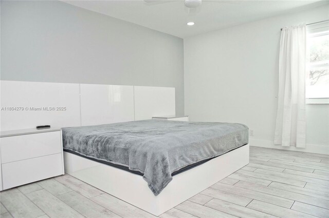 1328 NW 93rd Ter, Coral Springs, FL 33071 - bedroom with wood tiled floors and recessed lighting