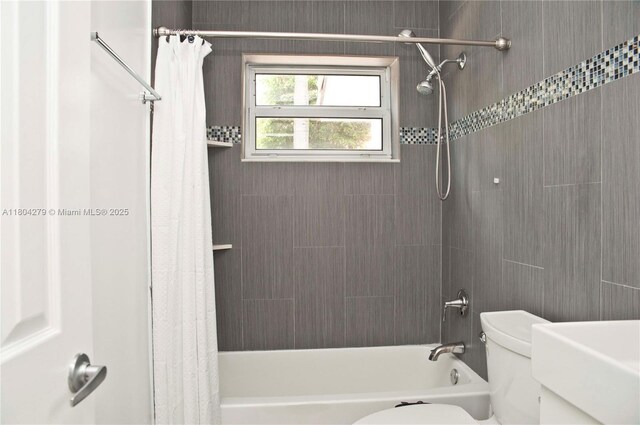 1328 NW 93rd Ter, Coral Springs, FL 33071 - bathroom featuring toilet and shower / bathtub combination with curtain