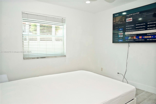 1328 NW 93rd Ter, Coral Springs, FL 33071 - bedroom featuring wood finished floors, recessed lighting, and baseboards