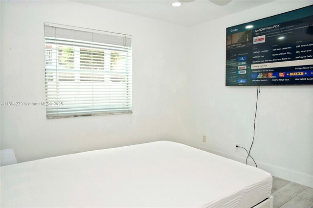 1328 NW 93rd Ter, Coral Springs, FL 33071 - bedroom featuring wood finished floors, recessed lighting, and baseboards