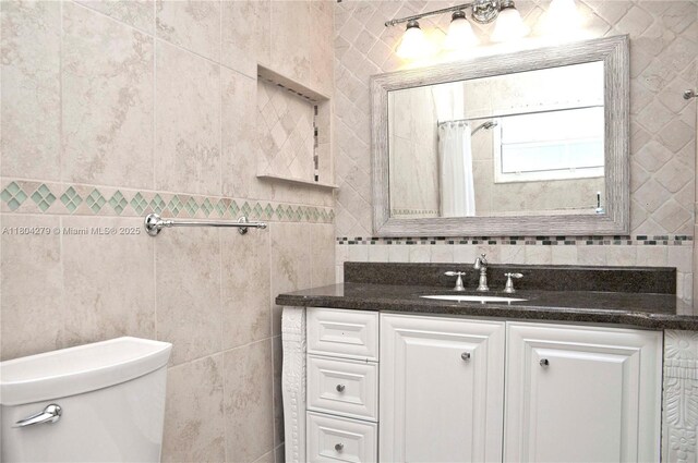 1328 NW 93rd Ter, Coral Springs, FL 33071 - full bathroom featuring tile walls, vanity, toilet, and a shower with shower curtain