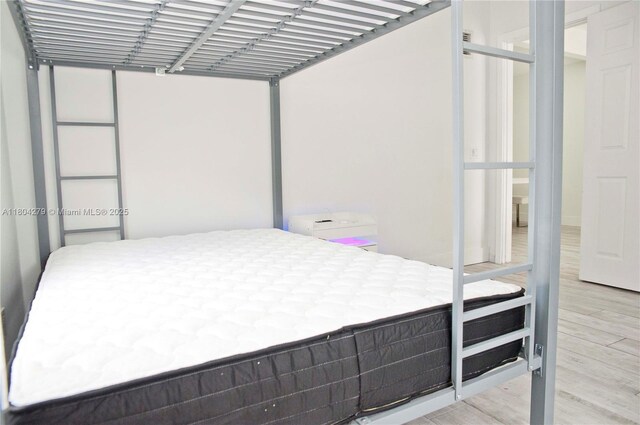 1328 NW 93rd Ter, Coral Springs, FL 33071 - bedroom featuring light wood-style flooring