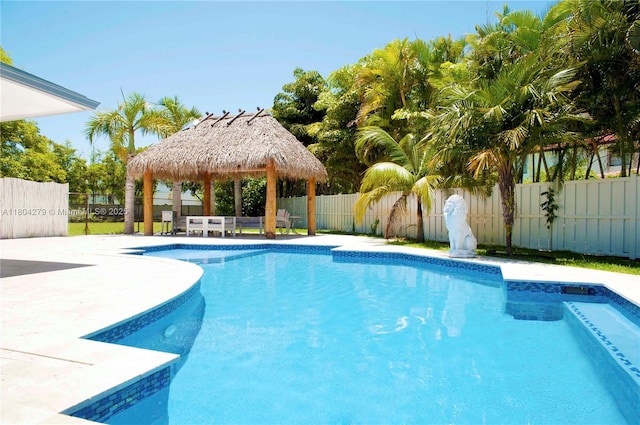 1328 NW 93rd Ter, Coral Springs, FL 33071 - view of pool featuring a gazebo, a fenced backyard, and a patio area