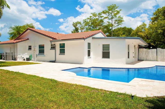 1328 NW 93rd Ter, Coral Springs, FL 33071 - rear view of property featuring a tiled roof, a patio area, and stucco siding