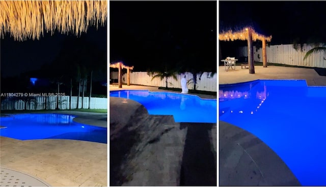 1328 NW 93rd Ter, Coral Springs, FL 33071 - pool at night with a fenced backyard and a patio