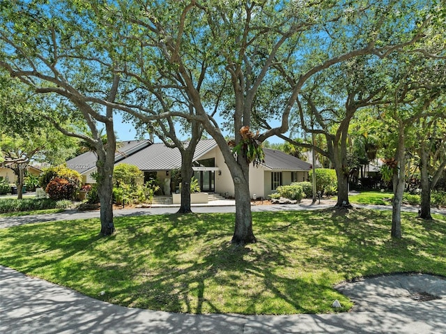 7350 SW 154th Ter, Palmetto Bay, FL 33157 - view of front of property with a front lawn and stucco siding