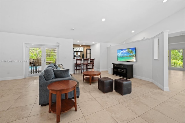 7350 SW 154th Ter, Palmetto Bay, FL 33157 - living room featuring light tile patterned flooring, baseboards, recessed lighting, and lofted ceiling