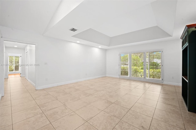 7350 SW 154th Ter, Palmetto Bay, FL 33157 - unfurnished room featuring light tile patterned flooring, a raised ceiling, plenty of natural light, baseboards, and recessed lighting