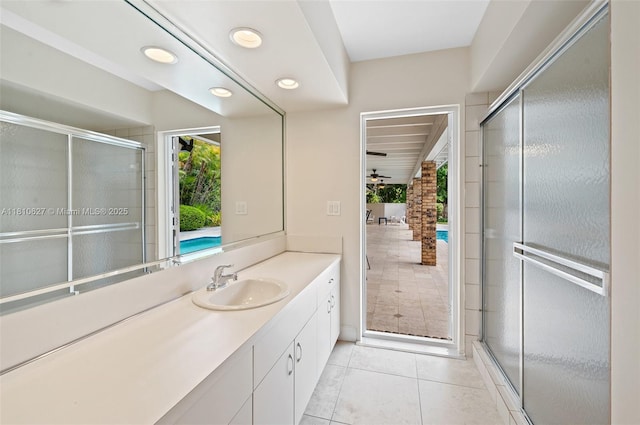 7350 SW 154th Ter, Palmetto Bay, FL 33157 - bathroom with vanity, tile patterned floors, recessed lighting, an enclosed shower, and a ceiling fan
