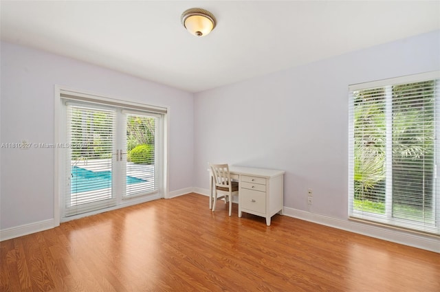 7350 SW 154th Ter, Palmetto Bay, FL 33157 - unfurnished office with light wood-style floors and baseboards