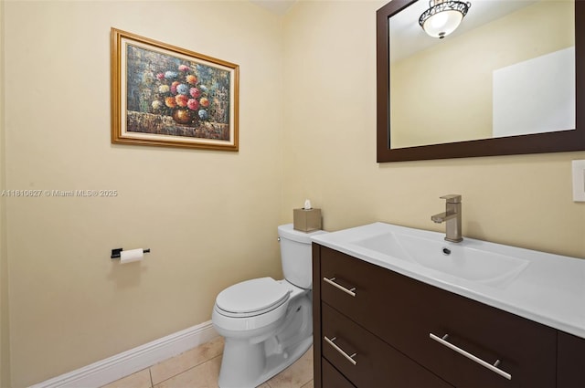 7350 SW 154th Ter, Palmetto Bay, FL 33157 - half bath with vanity, toilet, tile patterned flooring, and baseboards
