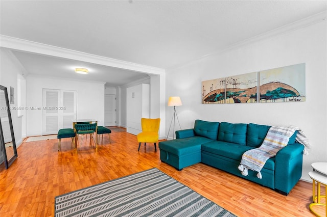 401 69th St Unit 708, Miami Beach, FL 33141 - living room with wood finished floors and ornamental molding