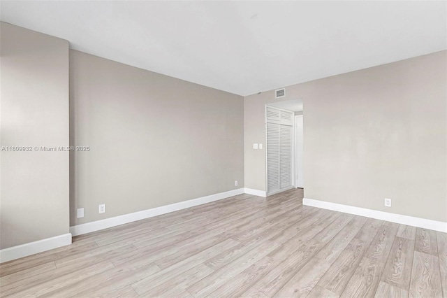 3700 Galt Ocean Dr Unit 1408, Fort Lauderdale, FL 33308 - empty room with light wood-style floors and baseboards