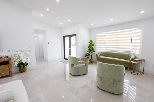 18781 SW 294th Ter, Homestead, FL 33030 - living area with lofted ceiling, recessed lighting, baseboards, and french doors