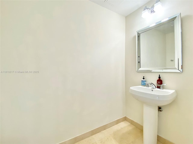 1060 Brickell Ave Unit 801, Miami, FL 33131 - bathroom with baseboards and tile patterned flooring