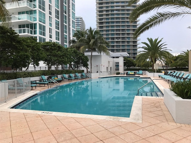 1060 Brickell Ave Unit 801, Miami, FL 33131 - community pool with a patio