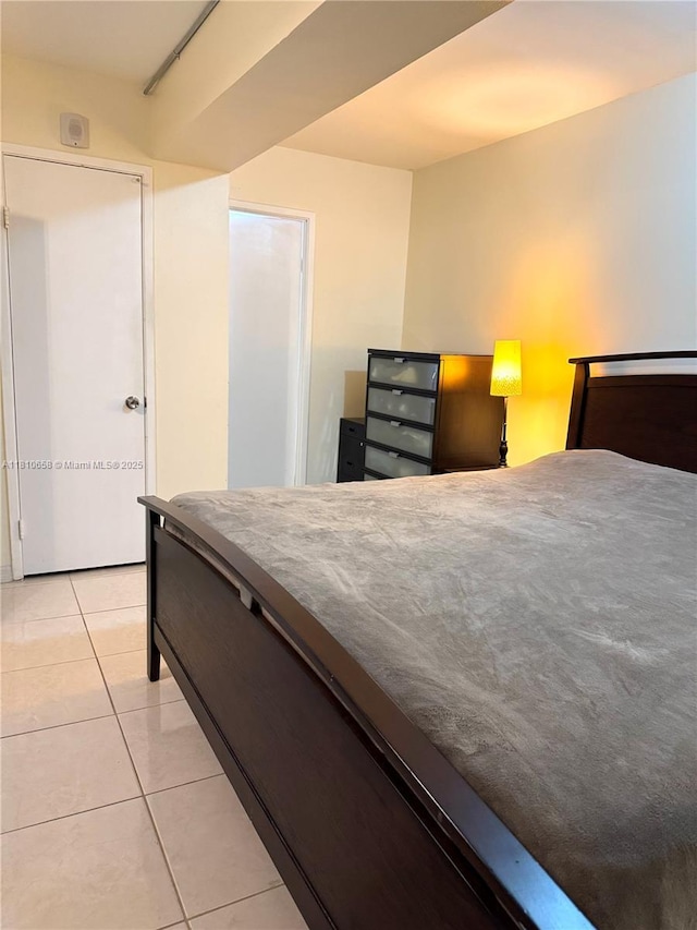 1780 NE 191st St Unit 412-2, Miami, FL 33179 - bedroom featuring light tile patterned flooring
