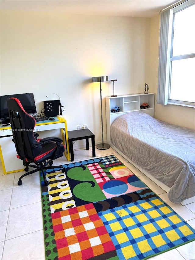 1780 NE 191st St Unit 412-2, Miami, FL 33179 - tiled bedroom featuring a desk