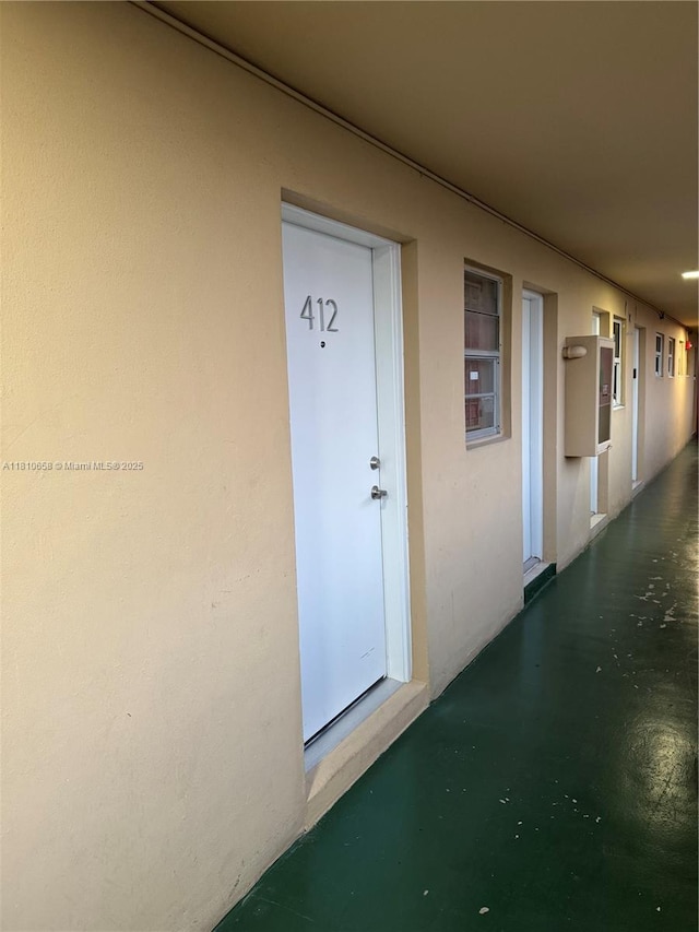 1780 NE 191st St Unit 412-2, Miami, FL 33179 - property entrance featuring stucco siding