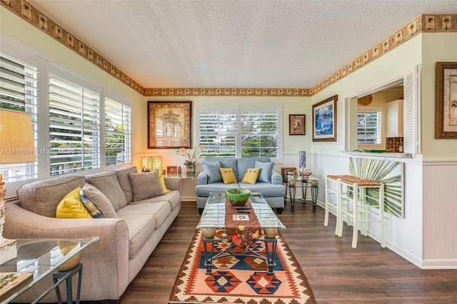 284 Prescott N Unit 284, Deerfield Beach, FL 33442 - living area with a textured ceiling, a wainscoted wall, and dark wood finished floors