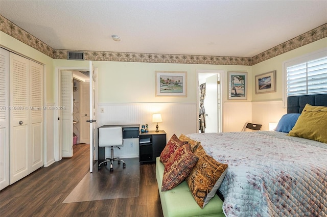 284 Prescott N Unit 284, Deerfield Beach, FL 33442 - bedroom with a wainscoted wall, dark wood-style flooring, and a desk
