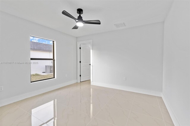 452 Mercedes Ct, Lehigh Acres, FL 33972 - unfurnished room with ceiling fan and baseboards