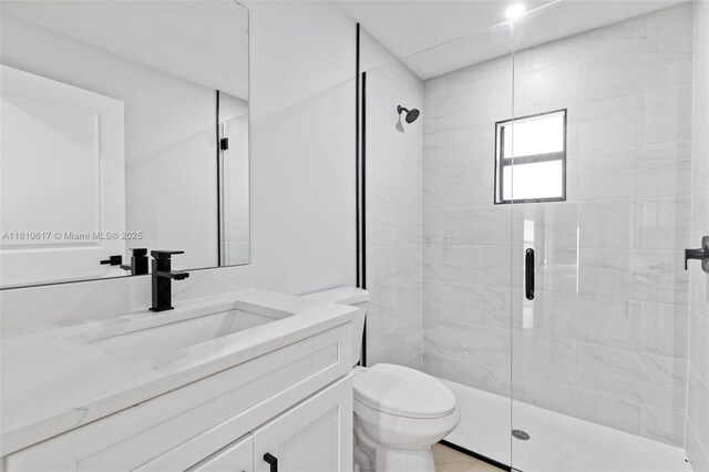 452 Mercedes Ct, Lehigh Acres, FL 33972 - full bathroom featuring vanity, a shower stall, and toilet