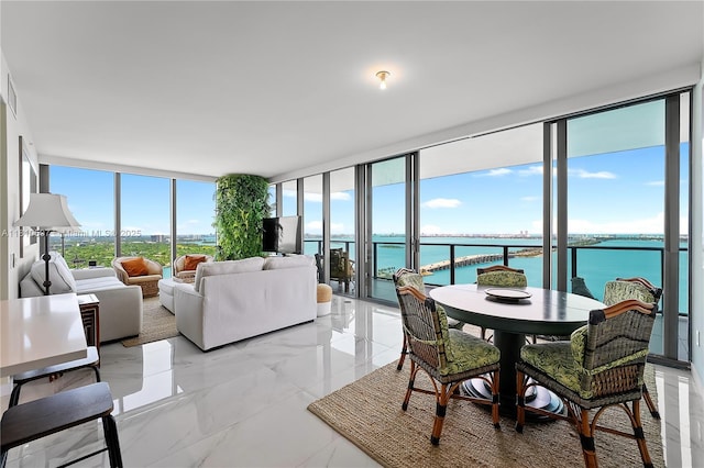 3131 NE 7th Ave Unit 3106, Miami, FL 33137 - dining space featuring floor to ceiling windows and light marble finish floors